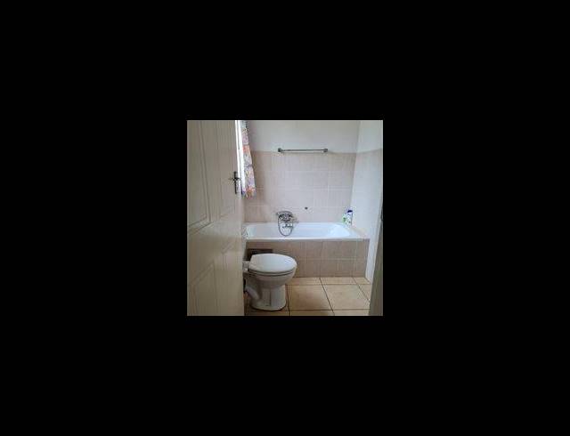 2 BEDROOM TOWNHOUSE FOR SALE IN ROOIHUISKRAAL NORTH